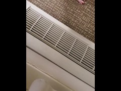 Pissing a full bladder into the window unit