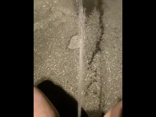 Naughty Girl Squats in her Driveway and Unleashes her Powerful Piss Fountain for the Public to see