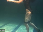 Preview 2 of Shaved brunette sissy Irina Polcharova naked in the pool
