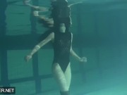 Preview 3 of Shaved brunette sissy Irina Polcharova naked in the pool