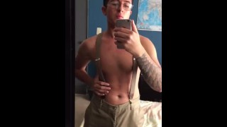 Tattooed man playing with his big dick. Lonely male masturbation.  