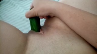 Sexy wife fucking herself with a cucumber