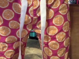 Girl pissing pajamas on the floor