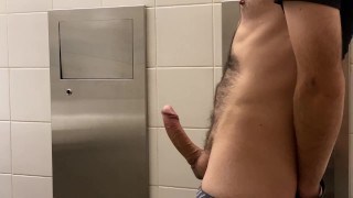 Jerking off my big cock in public restroom 