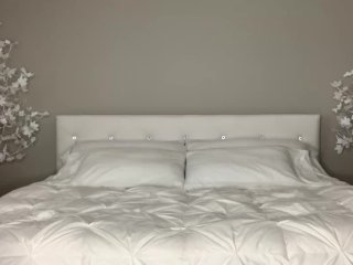 Fit babe modeling and stripping in her bed