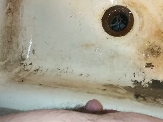 Just a small piss In a dirty sink.