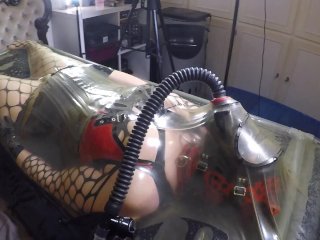 Miss Maskerade, enclosed in latex vacbed with gas maskand bubble bottle, full rubber bondage