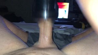 Hot guy shoots big load all over himself with rotating flesh light 