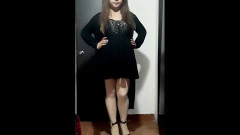 Cute crossdresser wearing dress and heels 