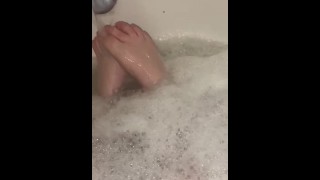 Clean feet playing with bubbles 