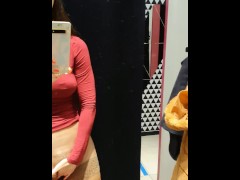 Store fitting room and sexy babe