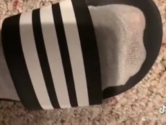 Cute teen feet in sports sandals