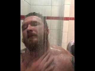 Stud in the shower playing with cock