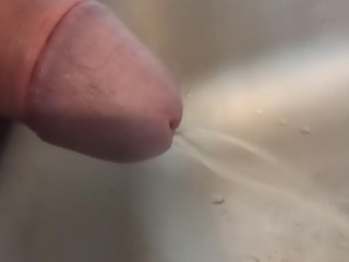 Close up of Cock while Pissing in the Sink