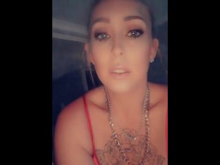 Hot milf with big tits and tattoos smoking a cigarette