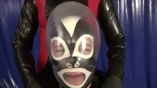 Rubber Girl Playing Breath Control Femdom Lesbian With A Latex Condom Over Her Head
