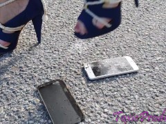 She crushed her Iphone under metal tipped stilettos
