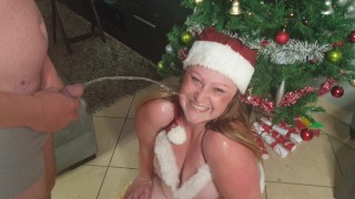 Christmas slut gets a piss facial