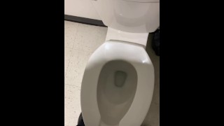 Guy in uniform pissing in work bathroom