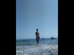 Wet and topless with algae at sea