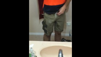 Tradie in hiviz shows his cock in the mirror