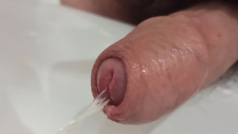 Foreskin pissing and playing. Close up POV