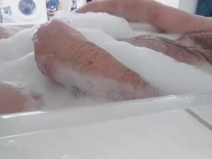 pregman in labor and cuming in the bathtub