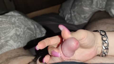 I jerk off his little dick with my long nails until he cums himself in the face