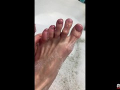 show and caress my feet in the bathroom. Soft and gentle feet in foam