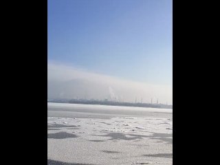 Winter city across the river.