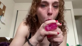 giving this dildo a sloppy blowjob 