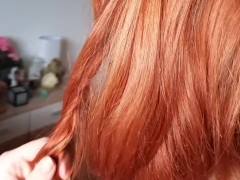 Playing with my hair topless