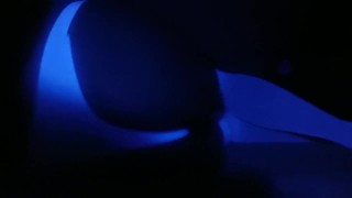 Crossdresser under UV light 