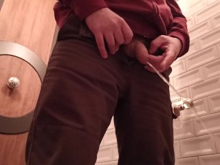 Peeing in a public fancy toilet