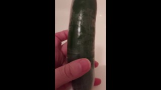 Fucked with a condom covered cucumber (repost)