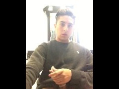 Solo male filling a condom with a huge load of cum. Tattooed man with a tasty big dick