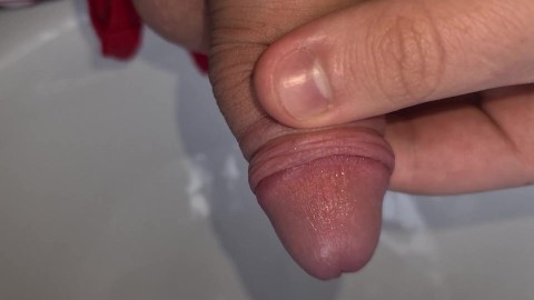 19 year old playing with uncut cock and pissing fun