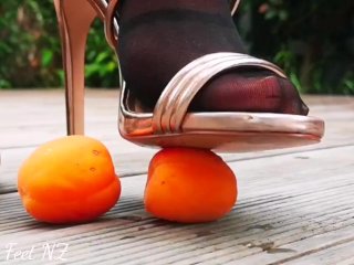 Apricot Squishing in HeelsAnd Nylon Stockings toSatisfy Your Foot Fetish