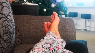Crossed Feet on Couch to satisfy your Foot Fetish