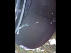 Guy cums on already cummed on Milf ass in black tights outside