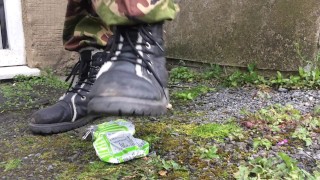 Elf stamps on cans with her dirty boots.