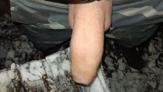 Touching snow with cock , pee and cum in snow