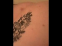 Muscular guy takes shower