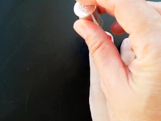 Red nail polish on toes. lady paints her toenails with red polish Regina Noir.