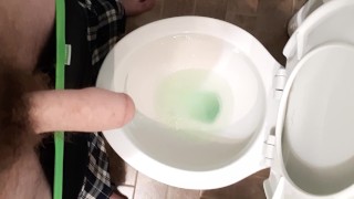 FTM Pissing With His Hard Penis