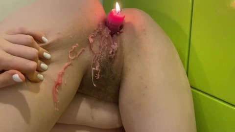 A. Sky Slave inserted a burning candle into her pussy, wax drips on hairy pussy and legs!