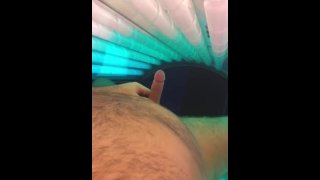 Rubbing one out in tanning bed