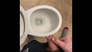 Taking a yellow piss while working on a house