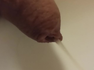 Extreme Closeup Pissing Uncutted Cock.
