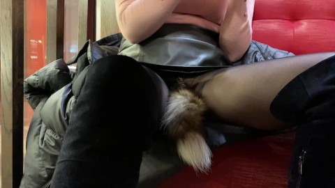 A. Sky Masturbating in a cafe, and in the ass plug (cat's tail)!